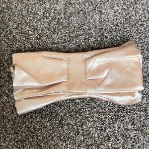 5/$22 gold satin-y bow clutch